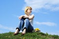 Female student outdoor on gren grass with books Royalty Free Stock Photo