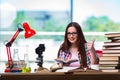 The female student preparing for chemistry exams Royalty Free Stock Photo