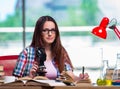 Female student preparing for chemistry exams Royalty Free Stock Photo