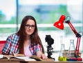 Female student preparing for chemistry exams Royalty Free Stock Photo