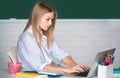 Female student preparing for test or exam.on lesson lecture in classroom at high school or college. Royalty Free Stock Photo