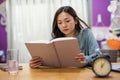 Female Student read book for final exam Royalty Free Stock Photo