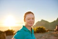 Female student with red hair and freckles on a nature hike