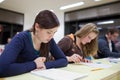 Female student sitting in a classroom