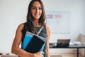 Female student smiling and looking at camera Royalty Free Stock Photo