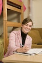 Female student studying in her dormitory