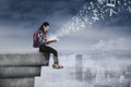 Female student studying on rooftop Royalty Free Stock Photo