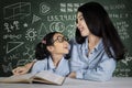 Female student talking with teacher Royalty Free Stock Photo