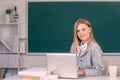 Female student in university, school education, Young woman study in college classroom on blackboard background. Royalty Free Stock Photo