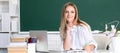 Female student in university, school education, Young woman writing, study in college classroom. Royalty Free Stock Photo