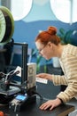 Female Student using 3D Printer in Engineering Class Royalty Free Stock Photo