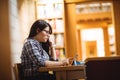 Female student using digital tablet Royalty Free Stock Photo