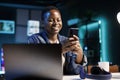 Female student using mobile device Royalty Free Stock Photo