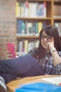 Female student using mobile phone Royalty Free Stock Photo