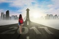 Female student walking through arrow and 2017 Royalty Free Stock Photo