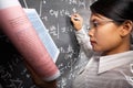 Female student working on equation