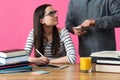 Female student working one to one with tutor. Tutor helping student to prepare for exams. Royalty Free Stock Photo