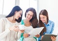 Female students studying together at home Royalty Free Stock Photo