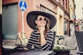 Female in sunglasse and summer hat