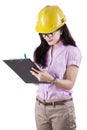 Female supervisor making checklist Royalty Free Stock Photo