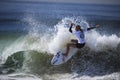 Female surf competitor makes a splash