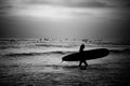 Female Surfer on the Beach Royalty Free Stock Photo