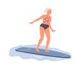 Female surfer ride on surf board. Active woman in swimsuit standing on surfboard and catching wave. Sportswoman in