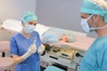 Female surgeon anaesthetist at patient operating room Royalty Free Stock Photo