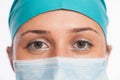 Female surgeon looking at camera