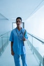 Female surgeon looking at camera in the corridor of hospital Royalty Free Stock Photo
