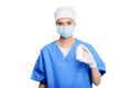 female surgeon in medical mask holding pill bottle