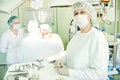 Female surgeon nurse at child operating room