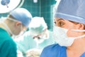 Female surgeon with surgical team Royalty Free Stock Photo