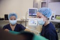 Female Surgical Team Working On Patient In Hospital Operating Theatre Royalty Free Stock Photo