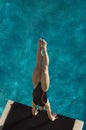 Female Swimmer Diving Into The Pool