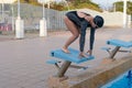 Female swimmer gushing through water in pool Royalty Free Stock Photo