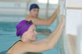 female swimmer ready to start competition Royalty Free Stock Photo