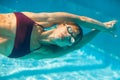 Female swimmer underwater in swimming pool Royalty Free Stock Photo