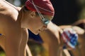 Female swimmers on starting blocks