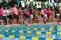 Female Swimmers About To Start Backstroke In Meet Royalty Free Stock Photo