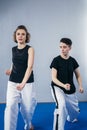 Female taekwondo instructor conducts personal training session for young woman at gym. Girl mastering new taekwondo moves during Royalty Free Stock Photo