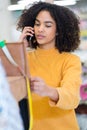 female tailor using mobile phone Royalty Free Stock Photo