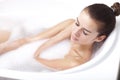 Female taking a bath. Royalty Free Stock Photo