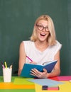 Female teacher smiling and teaching in classroom at school or university. Happy woman student teach and learn. Education Royalty Free Stock Photo