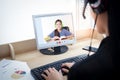 Female teacher teaches students from home By using a laptop computer via online video call. Royalty Free Stock Photo