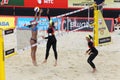 Female teams from Brazil play volleyball