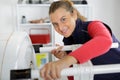 Female technician servicing boiler using tablet computer Royalty Free Stock Photo