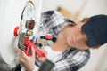 female technician servicing boiler using tablet computer Royalty Free Stock Photo