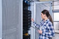 Female technician working on server maintenance Royalty Free Stock Photo