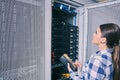 Female technician working on server maintenance Royalty Free Stock Photo